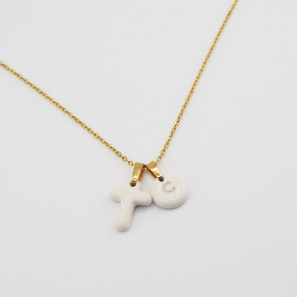 collar cruz con inicial